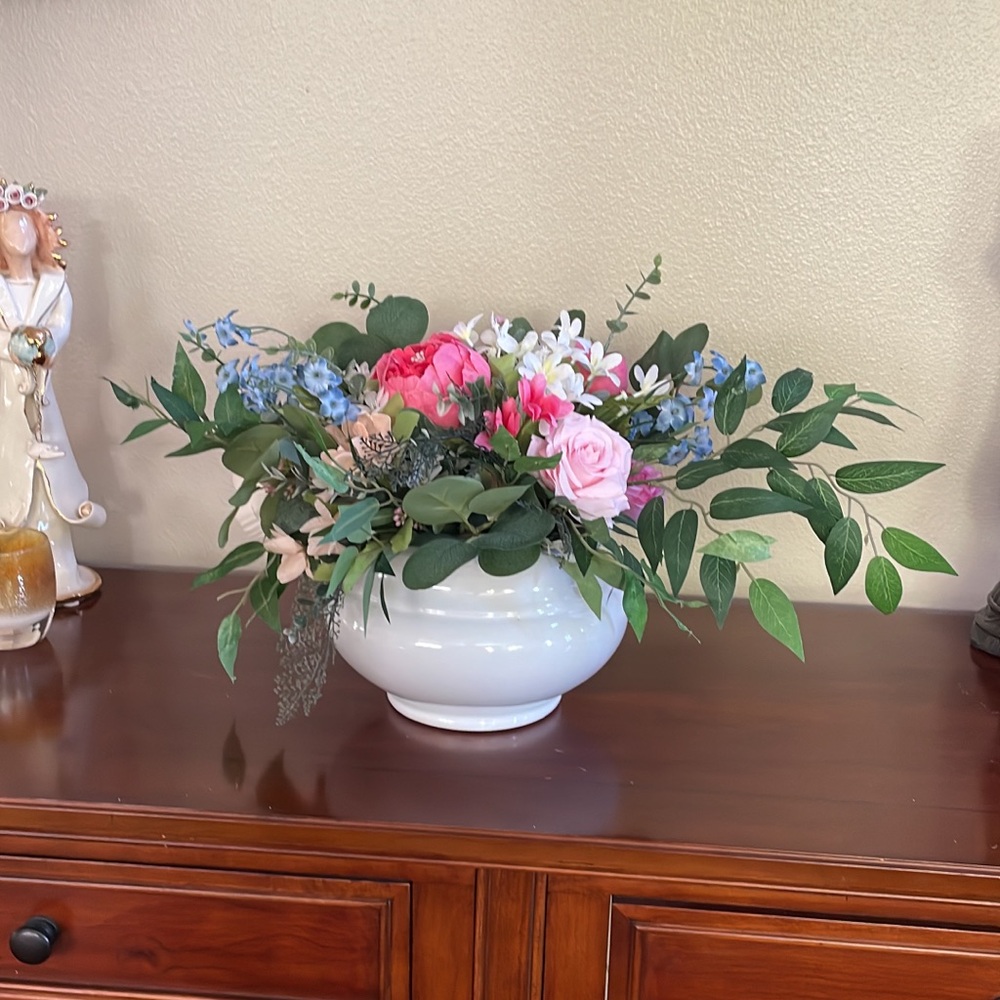 Large silk floral arrangement in ceramic vase